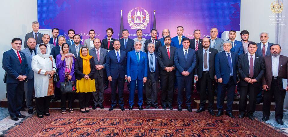 The Minister of Communications and Information Technology and the Afghan Post Chairman at the International Symposium were honored with personalities Moh.Wali Khan Darwazi